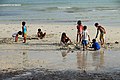 Children playing in the sands on a beach in the Philippines.jpg