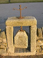 An old cheese press built into a wall opposite the Cromdale Outdoor Education Centre. Cromdale Cheese Press.JPG