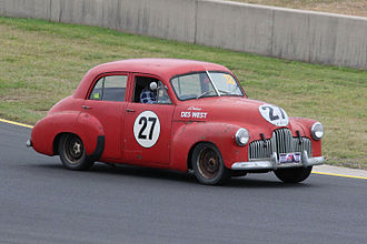 The Holden 48-215 of Des West, pictured in 2015. The car was blue when it contested the race, being painted red later in the year. Des West 1960 ATCC 48-215.JPG