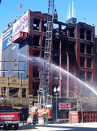 Dexter Building under demolition after fire