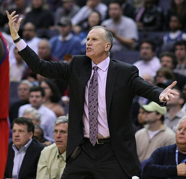 Collins coaching the Philadelphia 76ers in 2010