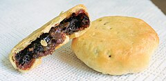 Image 40Eccles cake is a small round flaky pastry cake filled with currants, sugar and spice. It is native to Eccles. (from Greater Manchester)