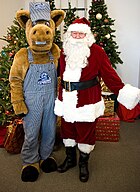 Express mascot Traxx the horse (left) ExpressTraxxwithSanta.jpg