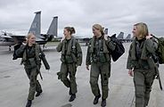 Capt. Jamieson walks with three female fellow F-15 Eagle pilots