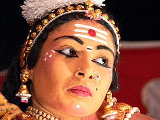 A Yakshagana dancer with tripundra on her forehead Face of Parvati dancer.jpg