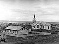 Vardø kirke fra 1869 ble tegnet av Chr. H. Grosch. Den ble brent av tyskerne under andre verdenskrig i 1944. Foto: Anders B. Wilse