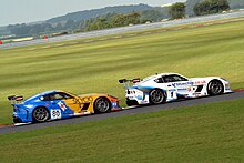 2013 champion Tom Ingram(#80) chasing runner-up Carl Breeze(#1). Ginetta 08 (9454087294).jpg