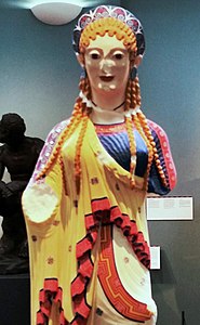 Color reconstruction of statue of a young girl from the w:Parthenon in Athens, 520 BC. Based on analysis of trace pigments.