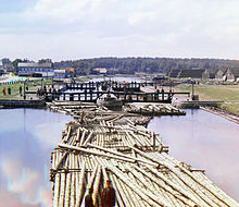 Timber rafts being floated into the city of Shlisselburg, in northwestern Russia (1909). Gorskii 04417u.jpg