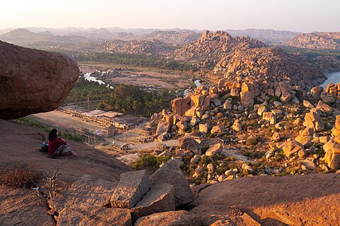 Hampi's ancient granite boulder landscape at sunset, Karnataka, South India