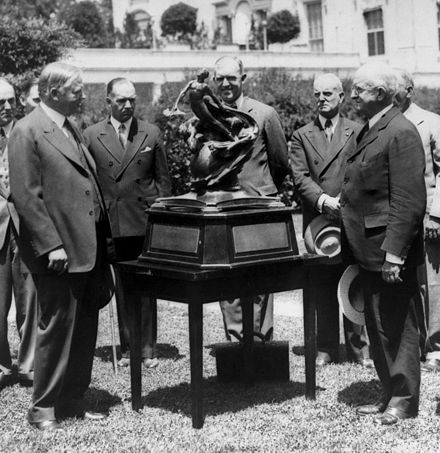 Herbert Hoover presents the 1929 Collier Trophy to NACA Chairman Joseph Ames for the NACA cowling