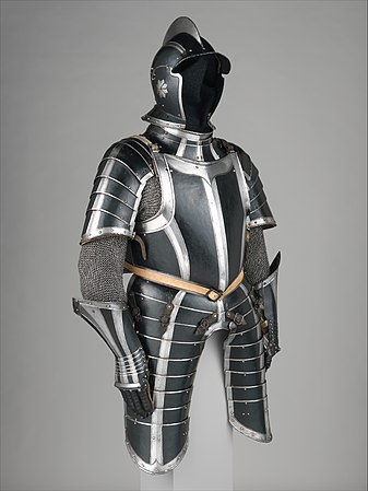 Black painted suit of German armor crafted circa 1600. As with many outfits, black in the piece is used to contrast against lighter colors.[25]
