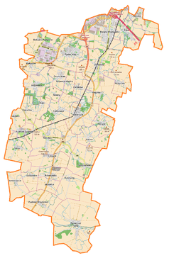 Mapa konturowa gminy Kobierzyce, blisko górnej krawiędzi nieco na prawo znajduje się punkt z opisem „ATM Grupa Spółka Akcyjna”