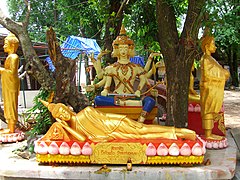 Statue of Brahma in a Laotian Buddhist temple.