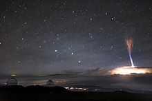 The telescopes at Maunakea and red sprite lightning. Amongst these telescopes is Gemini North, the northern member of the international Gemini Observatory, a Program of NSF’s NOIRLab.