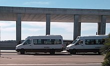 Autobus ARST in uso per le linee urbane cittadine in sosta dinanzi al centro intermodale di Carbonia Serbariu