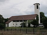 Deutsch: Evangelische Friedenskirche mit Gemeindesaal, Kindergarten sowie Mesner- und Kindergärtnerinnenwohnung samt Garten und Freifläche, 1959/60.