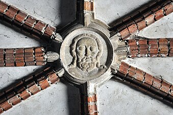A boss depicting Jesus Christ decorates the keystone in the rib-vaulting at Chapel of St. Anne in Malbork, 14th century.
