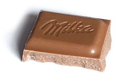 Milka Alpine Milk Chocolate chunk from 100g bar.jpg