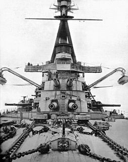 Superfiring Arrangement of gun turrets on a warship with one higher and behind the other
