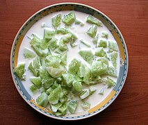Dish with cucumber cut pieces (mizeria)