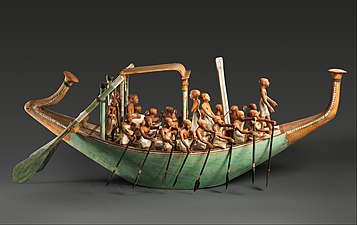 Model paddling boat, c.1981-1975 BC, wood, paint, plaster, linen twine and linen fabric, Metropolitan Museum of Art, New York City