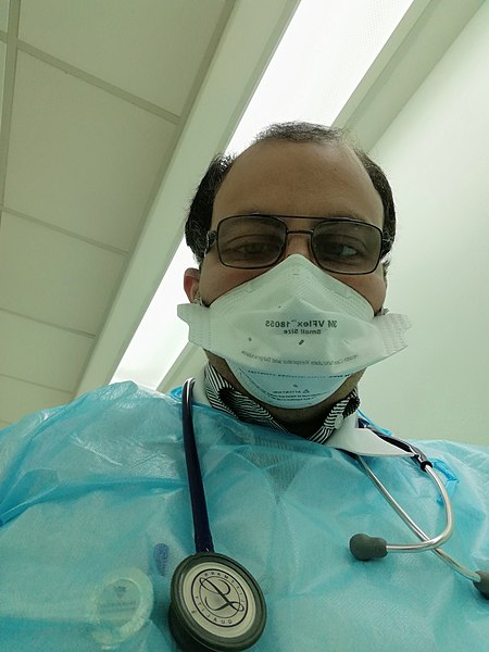 File:N95 mask while visiting a TB case.jpg