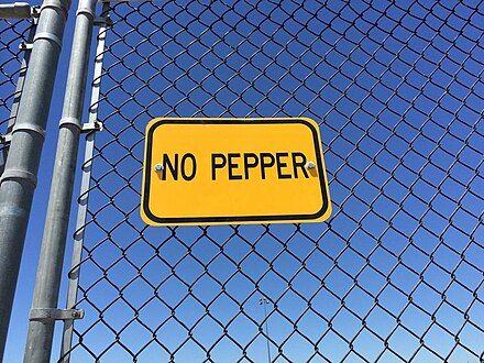 NO PEPPER sign posted at public baseball field park in Brentwood, CA