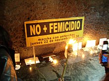 A candle memorial to women killed by femicide (femicidio), Chile, 2007. No femicidio.jpg