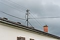 English: Reconstruction of an overhead power line at the residential house Deutsch: Umrüstung der Stromzuleitung am Wohnhaus