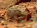 This view of Stimpy, in the Rock Garden, was produced by combining the "Super Panorama" frames from the IMP camera. Super resolution was applied to help to address questions about the texture of this rock and what it might tell us about its mode of origin. The composite color frames that make up this anaglyph were produced for both the right and left eye of the IMP. These composites consist of 7 frames in the right eye and 8 frames in the left eye, taken with different color filters that were enlarged by 500% and then co-added using Adobe Photoshop to produce, in effect, a super-resolution panchromatic frame that is sharper than an individual frame would be. These panchromatic frames were then colorized with the red, green, and blue filtered images from the same sequence. The color balance was adjusted to approximate the true color of Mars. The anaglyph view was produced by combining the left with the right eye color composite frames by assigning the left eye composite view to the red color plane and the right eye composite view to the green and blue color planes (cyan), to produce a stereo anaglyph mosaic. This mosaic can be viewed in 3-D on your computer monitor or in color print form by wearing red-blue 3-D glasses. Mars Pathfinder is the second in NASA's Discovery program of low-cost spacecraft with highly focused science goals. The Jet Propulsion Laboratory, Pasadena, CA, developed and manages the Mars Pathfinder mission for NASA's Office of Space Science, Washington, D.C. JPL is a division of the California Institute of Technology (Caltech). The left eye and right eye panoramas from which this anaglyph was created is available at PIA02405 andPIA02406