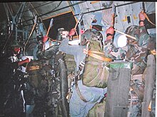 Co.F troops with full equipment exiting a C-130 Hercules Paratroopers Co F 425th Infantry MI NG.JPG