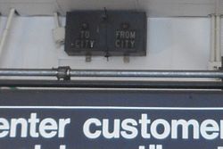 Old "To City"/"From City" train indicators from the New York, Westchester and Boston Railway Pelham Pkwy; NYW&B To-From City Lighted Sign.jpg