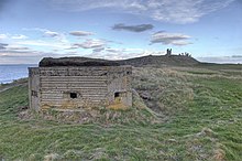 A type 24 concrete pillbox from the Second World War, positioned north of the castle Pillbox overlooking Embleton Bay, north of Dunstanburgh Castle - geograph.org.uk - 818577.jpg