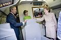 Nancy Reagan chats with President Bush aboard Air Force One at the opening of the Reagan Library's Air Force One Pavilion