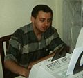 Public servant using computer in a public office in 2001.jpg