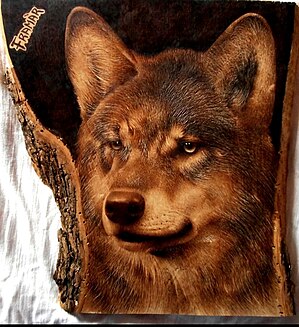 The King Wolf, pyrography on olive wood by Frangioni Roberto PyrographyFramar Pyrography.jpg