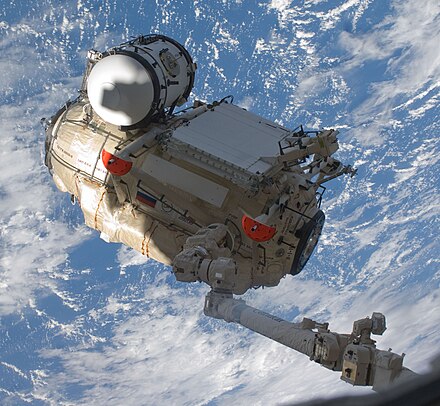 Canadarm2 moves Rassvet to berth with the station on STS-132, 2010