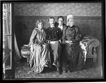 Family in 1893: Wife Fanny, Stevenson, his stepdaughter Isobel, and his mother Margaret Balfour Robert Louis Stevenson and family.jpg