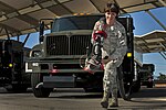 SrA Crystal Lane, 99th Logistics Readiness Squadron, pulls a fuel hose from an R-11 fuel truck at Nellis AFB.jpg