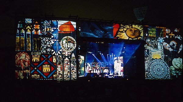 Projections designed by Clarke as part of the New World Tour stage sets, a collage of the history of stained glass, which were projected during the so