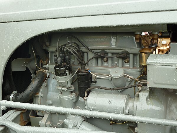 Spark plug side of cylinder head, showing the valve pushrod tubes (Ferguson TE20 tractor)