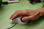 A right-handed trackball is difficult to use with the left hand