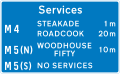 Availability of motorway service areas ahead with distances and names of operators