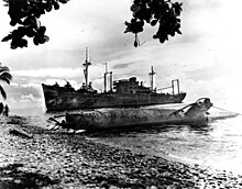 A Japanese two-man sub salvaged by 6th CB divers off Tassafaronga Point. They attached hawsers for bulldozers to pull the sub ashore after placing dynamite to break the mud suction force holding it. USMC Photo Nh-97250.jpg