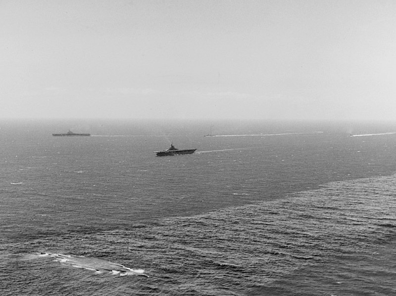 File:USS Boxer (CV-21) and USS Princeton (CV-37) steam past the capsized hull of USS New York (BB-34) off Hawaii on 8 July 1948.jpg