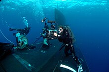 SEAL Delivery Vehicle Team (SDV) 2 conduct diving lock out US Navy 071026-N-3093M-012 Mass Communication Specialist 2nd Class Kori Melvin documents Navy divers and special operators from SEAL Delivery Vehicle Team (SDV) 2 and Naval Special Warfare Logistics Support conducting Lock Out.jpg