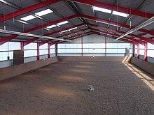 Interior view of a riding hall with watering facilities Ujezdzalnia wewnatrz.jpg