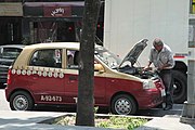 English: Broken Taxi near Alameda de Santa María, Mexico City