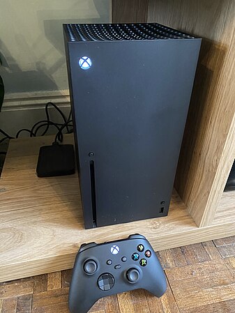 An Xbox Series X with controller.